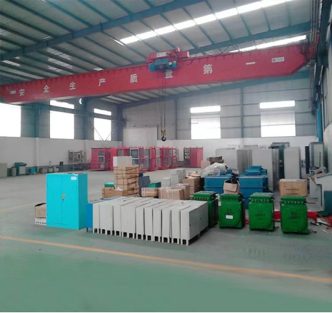 Red single girder overhead crane in workshop